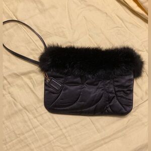 Coach fur-lined wristlet